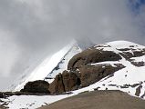 61 Mount Kailash South, East and North Faces From The Eastern Valley On Mount Kailash Outer Kora A bit more of the Kailash Eastern Face comes into view as the trail descends the Eastern Valley. The Kailash South Face is to the left and a bit of the North Face is to the right.